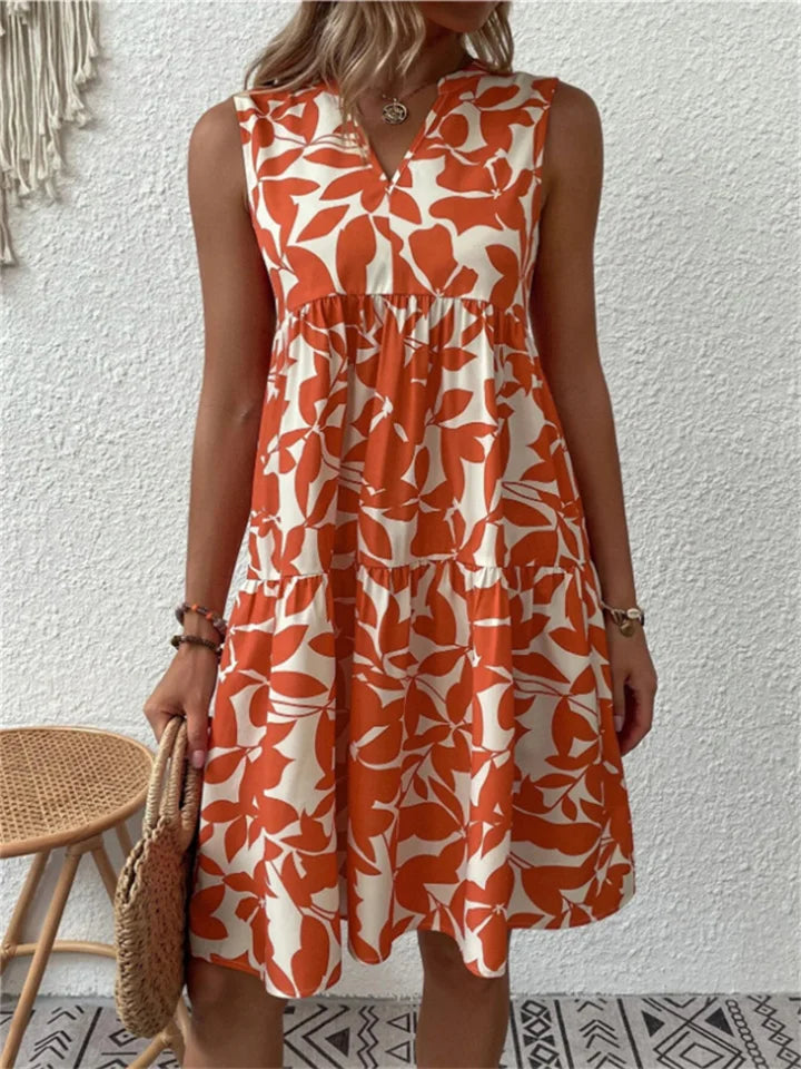 Nivara – Midi-Kleid mit ausgestelltem Schnitt und Polka-Dots