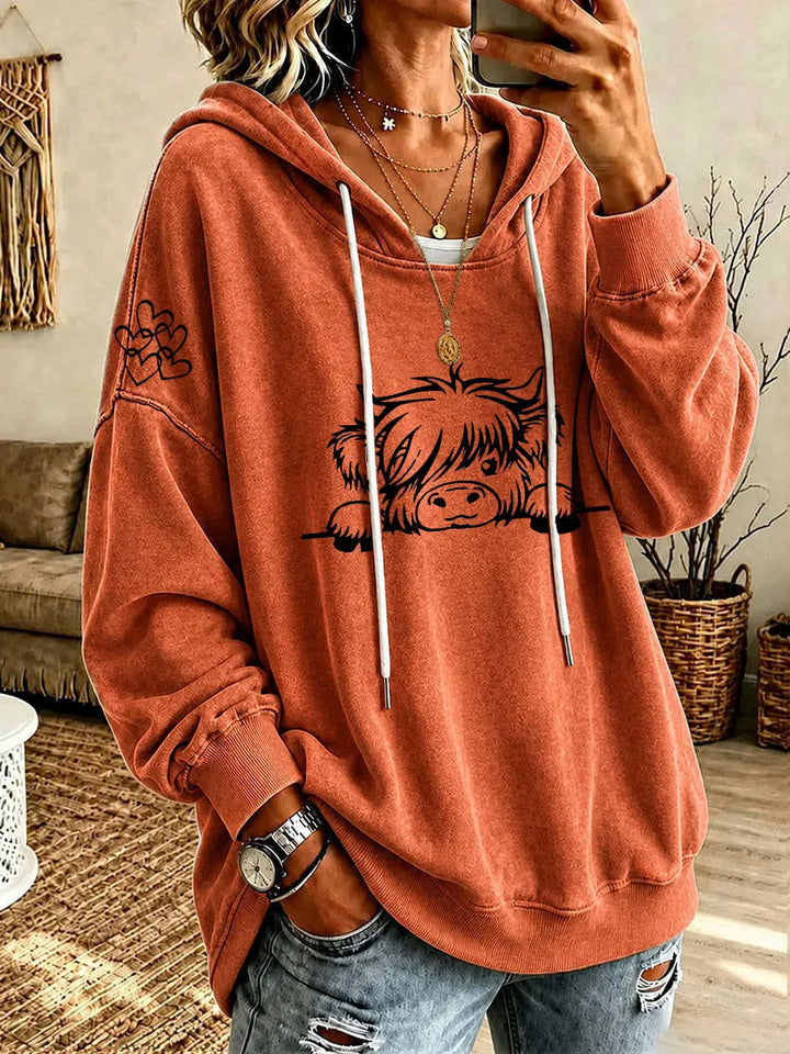 Noreli – Allover-Highland-Rinder-Print Strick-Kapuzenpullover