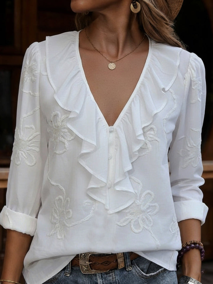 Virela – Blumenbesticktes Baumwollshirt