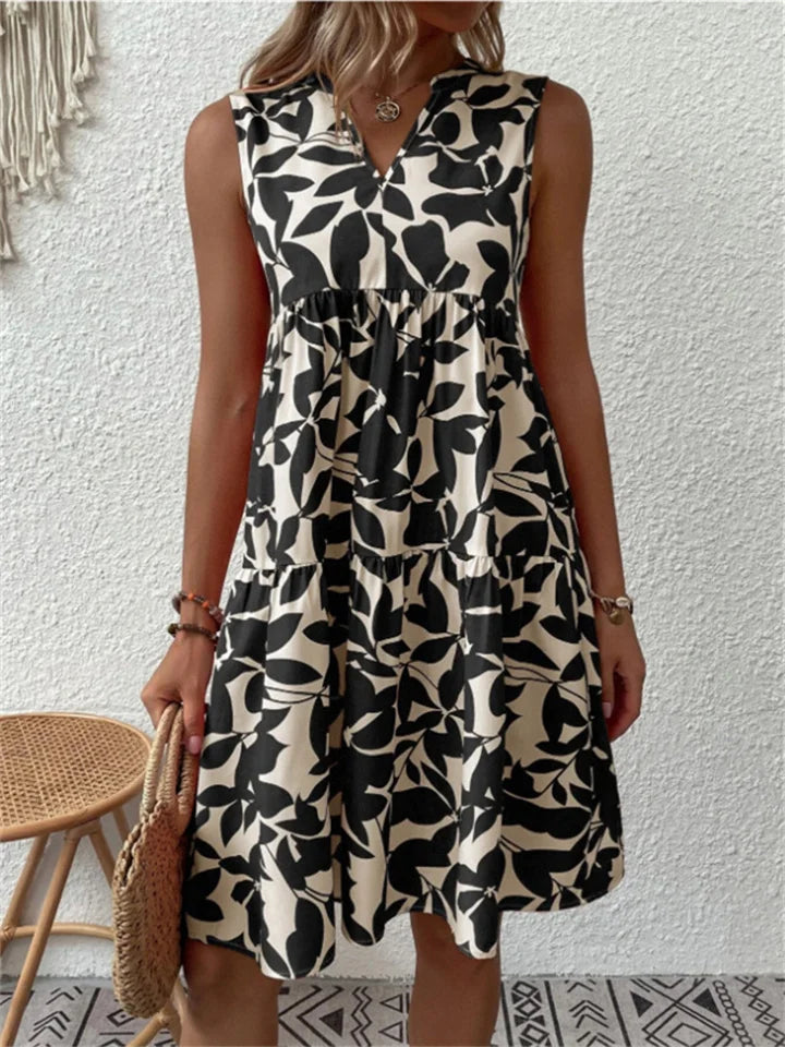 Nivara – Midi-Kleid mit ausgestelltem Schnitt und Polka-Dots