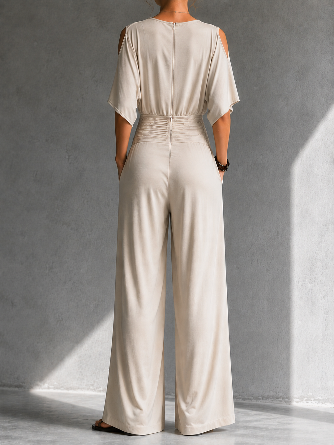 Nivara – Schulterfreier Jumpsuit