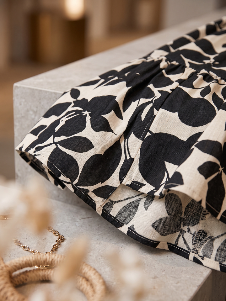 Nivara – Midi-Kleid mit ausgestelltem Schnitt und Polka-Dots