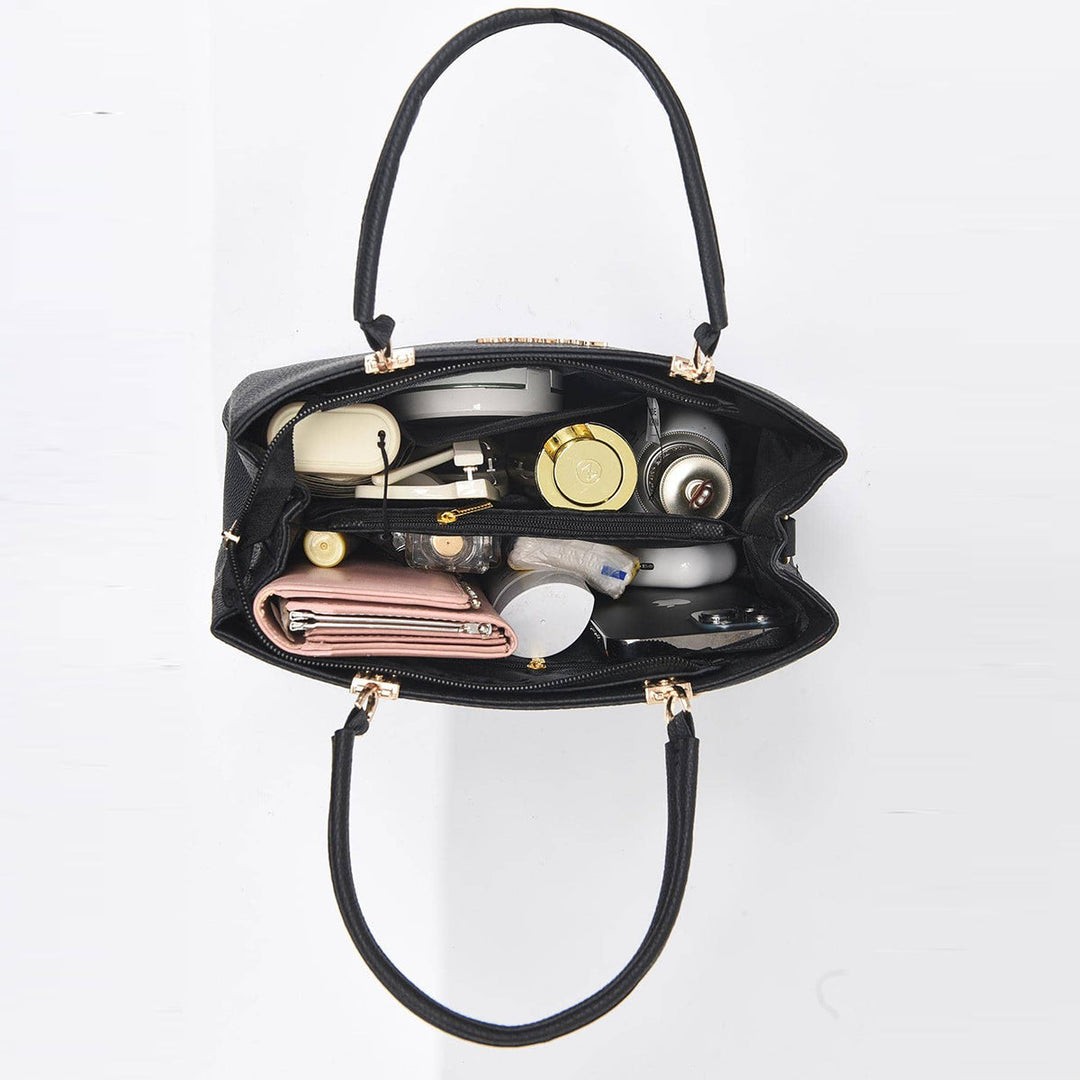 Nirela – Muschelform mit beschichteter Oberfläche Handtasche