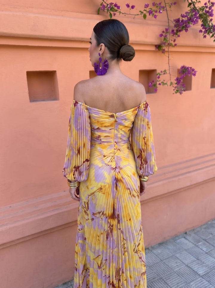Nivara – Kleid mit floralem Druck und geformtem Ausschnitt